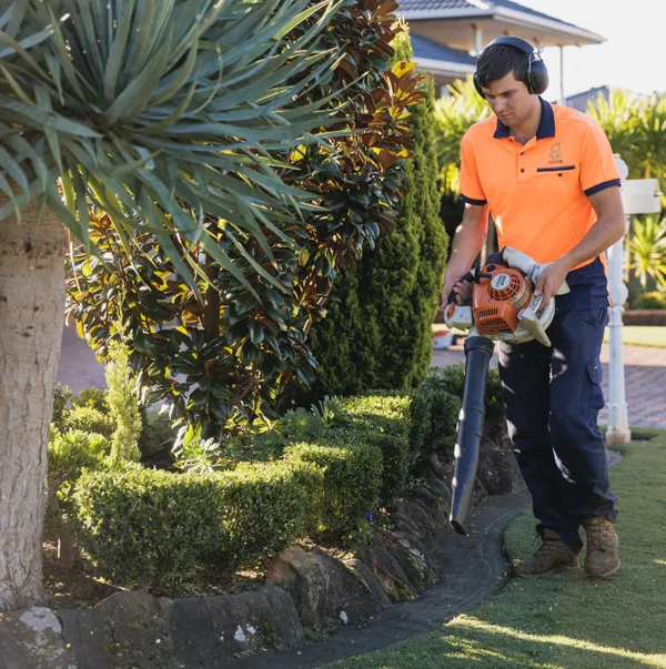 Keeping It Green team member blowing off a driveway in Camden NSW