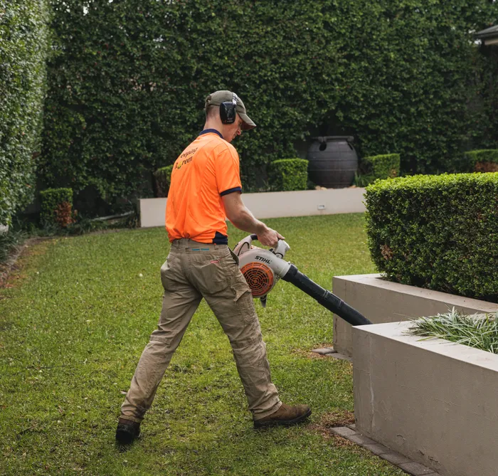 Keeping It Green team member mowing a commercial property in Camden NSW