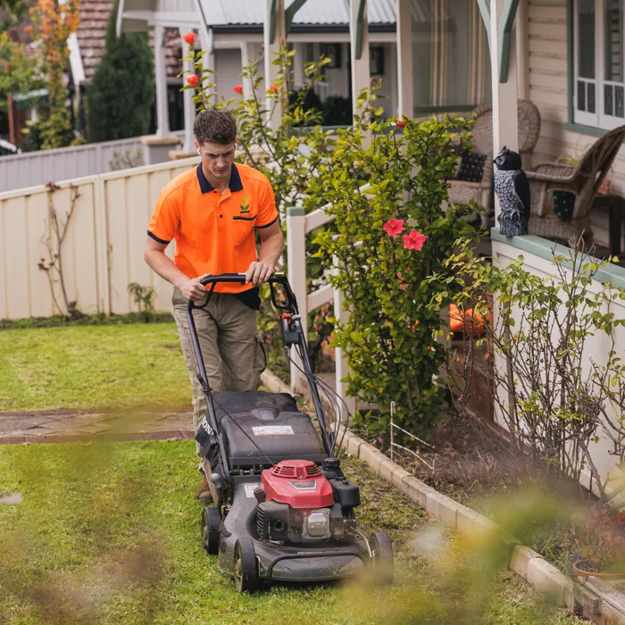 Commercial mowing crew servicing a business grounds area in Camden NSW