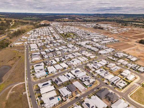 Aerial view of Menangle Park showing established homes and surrounding farmland
