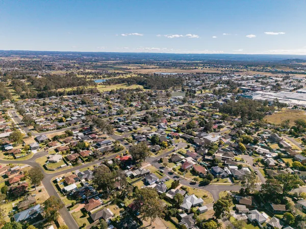Aerial view of Narellan showing established homes and surrounding farmland
